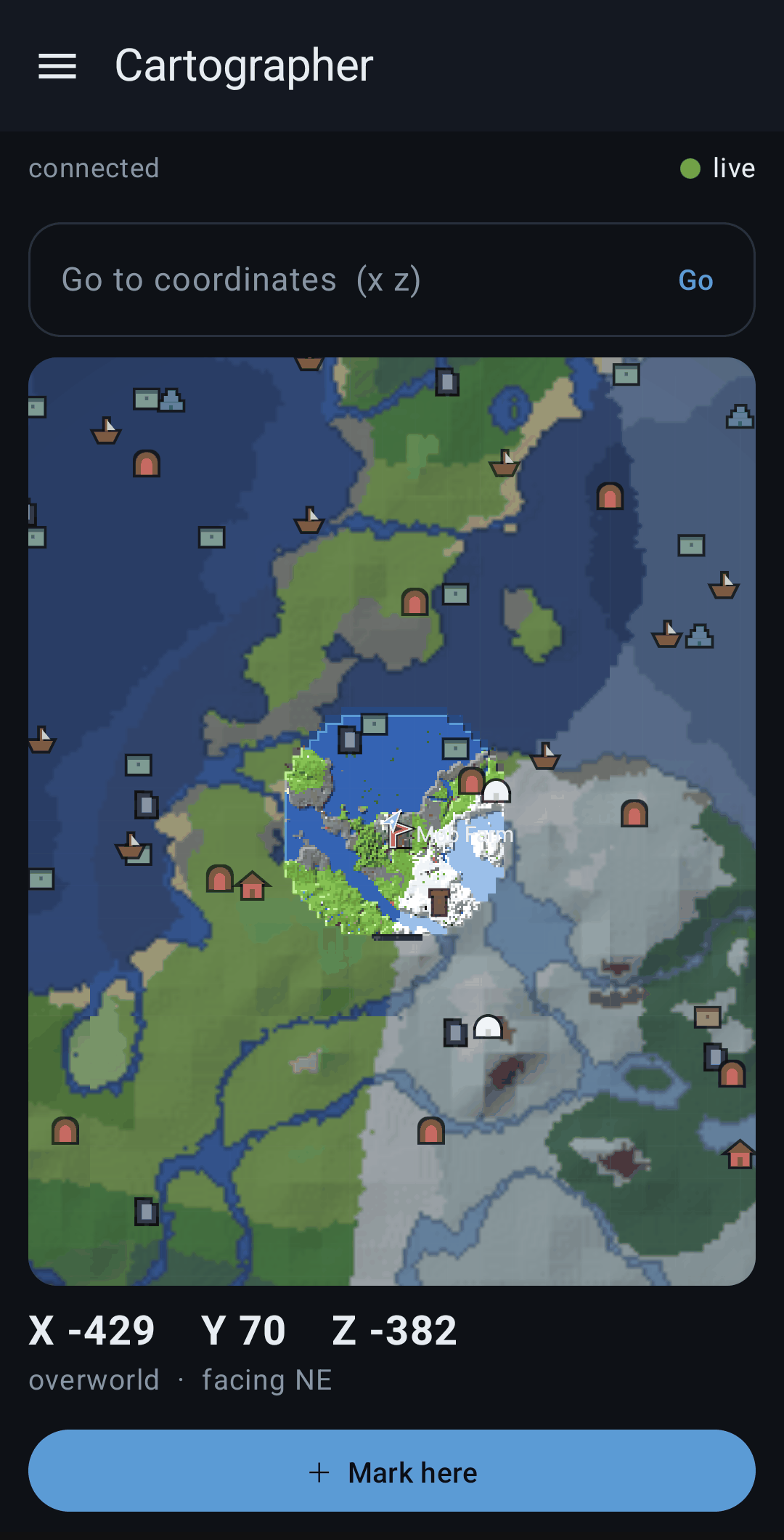 Zoomed out: the seed-generated world continuing past the explored edge, with structure markers